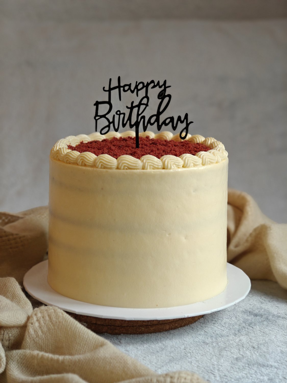 Classic red velvet cake with ivory cream cheese frosting